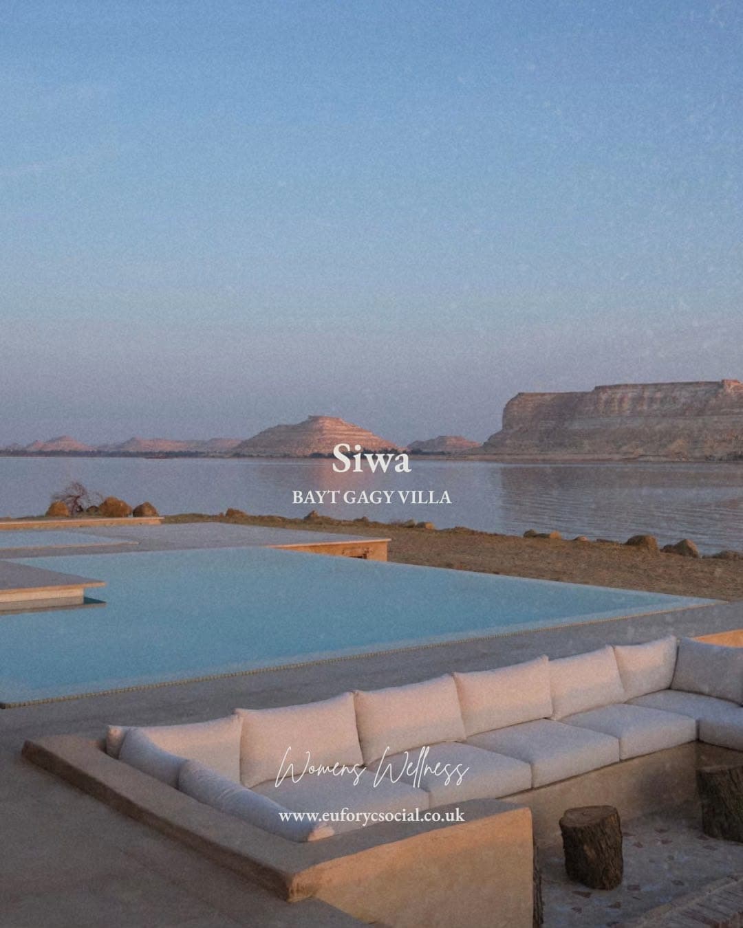 The infinity pool at Bayt Gagy Villa at dusk, looking out over the salt lake to the escarpment beyond