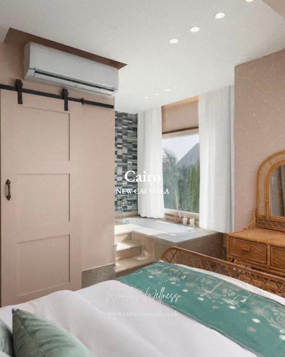 A blush-pink bedroom at New Cai Villa, mosaic bath and a window onto the palms