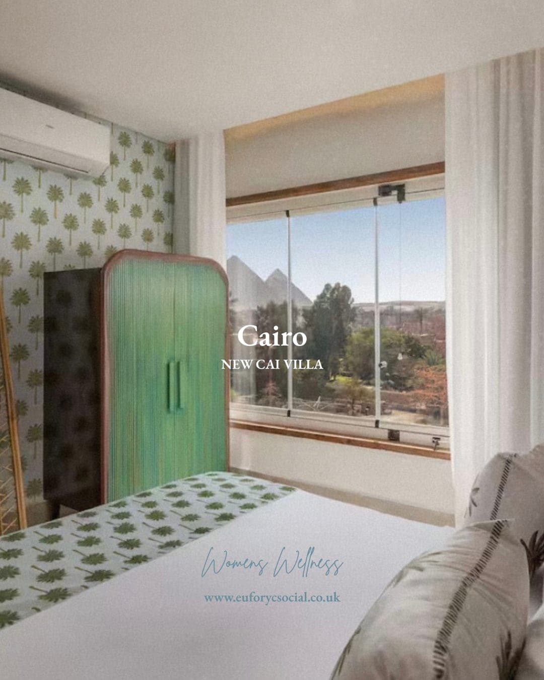 A palm-print bedroom at New Cai Villa, green wardrobe and the pyramids in the window